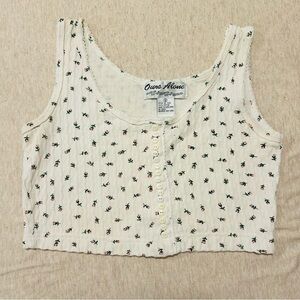Vintage cottage core tank top with a floral print and buttons